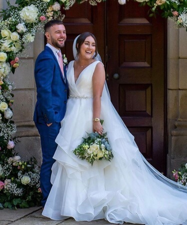 Rebecca Armstrong and Adam Armstrong on their wedding day.